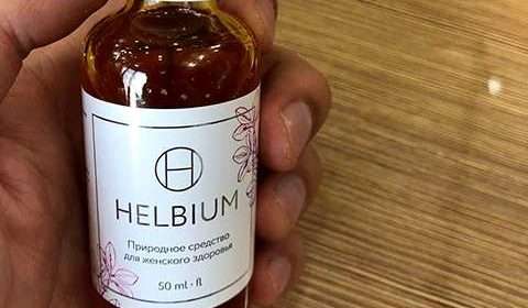 Фото препарата Helbium в руках покупательницы